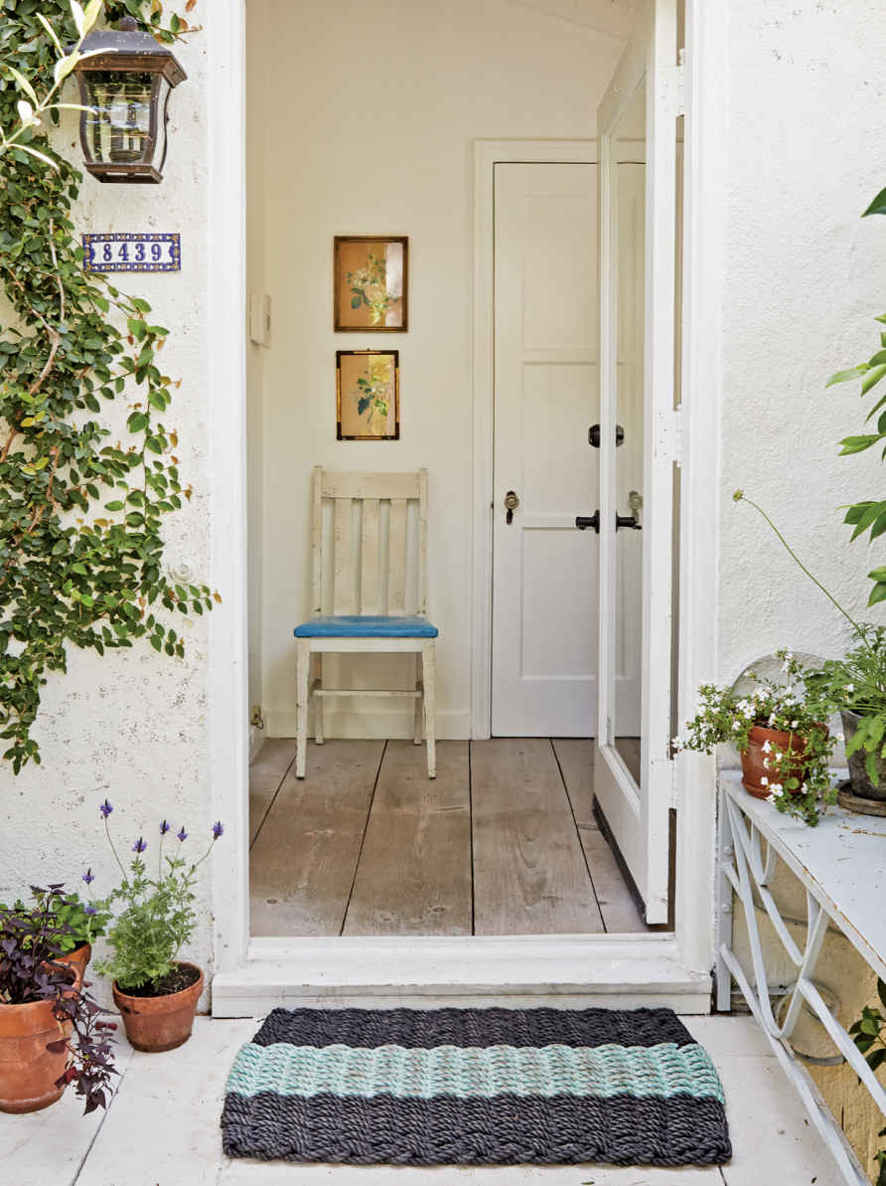 FEET FIRST. No front door is complete without a good door mat. Sure it will keep shoes clean, but, really, it is an opportunity to add more color and texture to your entry.