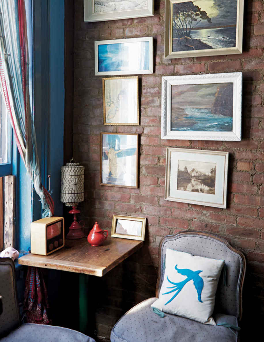 DON’T WORRY ABOUT WHAT THE RULES SAY. By most accounts, this little dining area would be located in the center of a room with space for the chairs to scoot into and away from the table. But this configuration, as it turns out, is far more laidback and inviting.
