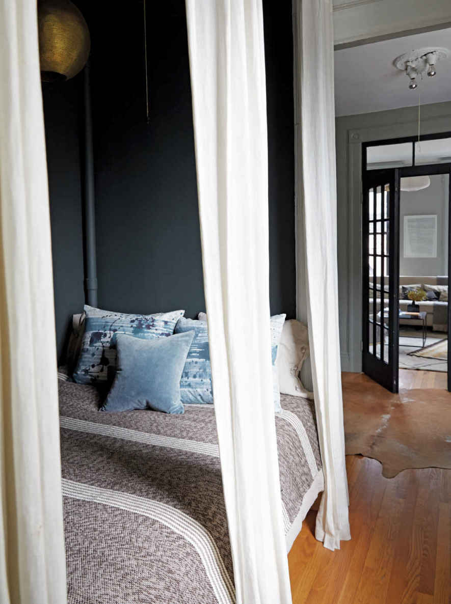 A MOROCCAN ALCOVE. Instead of two curtains, Emily hung three—which makes all the difference. Two panels can come off as youthful, while three feels sophisticated.